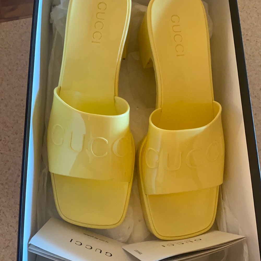 Yellow Gucci Rubber Slide Sandal.